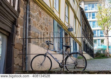 Saint-brieuc, France - August 24, 2019: Cityscape With Traditional Half-timbered Houses And Bicycle 