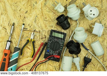 Installation Of Electrical Wiring And Connection Of Sockets And Plugs To Wires. Electrical Objects A