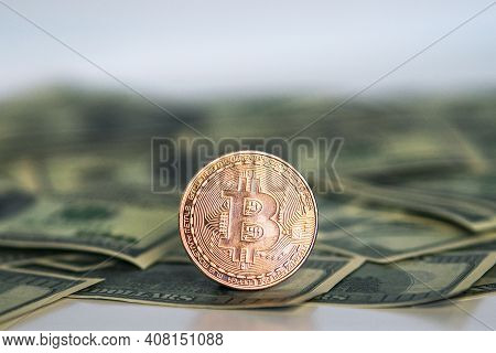 Golden Symbolic Coin Bitcoin On Banknotes Of Dollars. Exchange Bitcoin Cash For A Dollars. Cryptocur