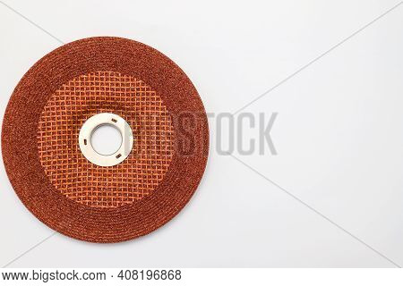 Abrasive Wheel, Grinding Disc Of Orange, Brown Color, Isolated On White Background. Abrasive Materia