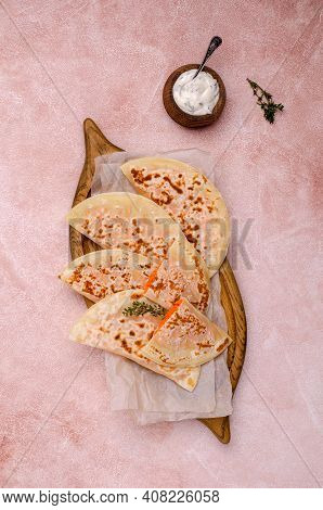 Baked Bread With Vegetable Filling On A Stone Background. Selective Focus.