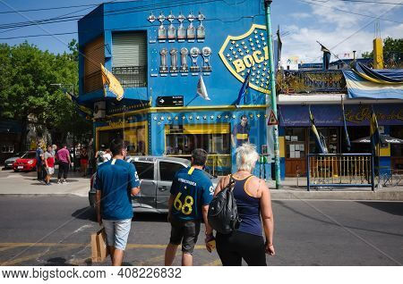 Buenos Aires, Argentina - January, 2020: Football Fans Of Boca Juniors Club Crossing Road Near La Bo