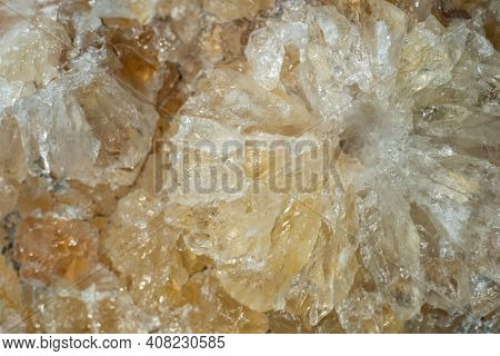 Macro Shot Of A Sample Of Natural Stone - Untreated Citrine (yellow Quartz). The Stone Grows In The 