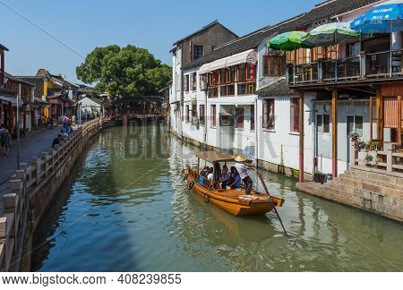 Shanghai, China - May 23, 2018: Boat cruise on the canal in Zhujiajiao water town.