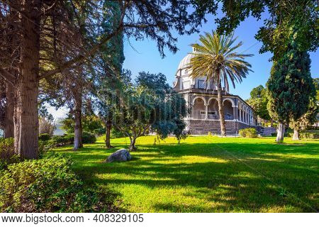 Israel. The Catholic Church of the Beatitudes of the Italian female Franciscan monastery on Mount Bliss. The Sea of Galilee. Blooming huge park around the monastery. concept of religious pilgrimage 