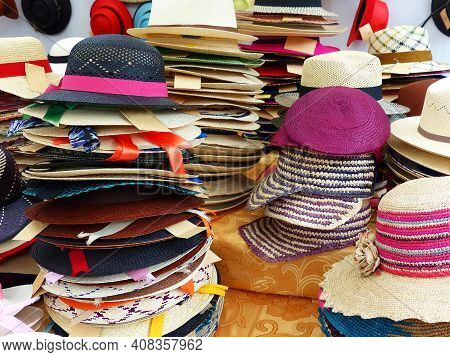 Colorful Handmade Panama Hats Or Paja Toquilla Hats Or Sombrero At The Traditional Outdoor Market In