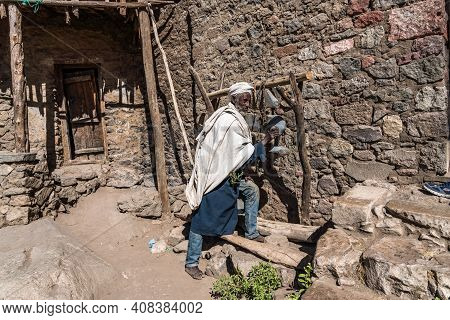 Lalibela, Ethiopia - Feb 14, 2020: Ethiopian People At The Famous Monastery Neakuto Leab Near Lalibe