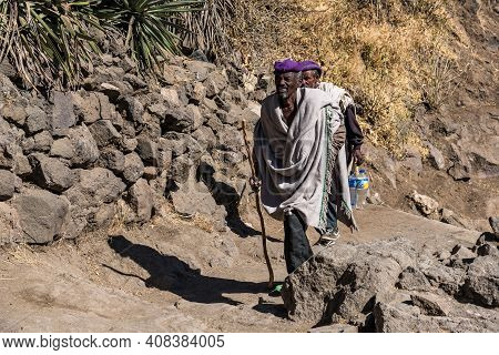 Lalibela, Ethiopia - Feb 14, 2020: Ethiopian People At The Famous Monastery Neakuto Leab Near Lalibe