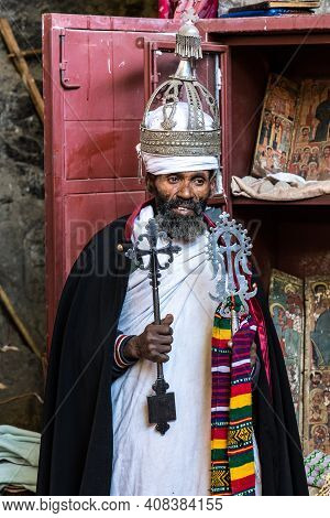 Lalibela, Ethiopia - Feb 14, 2020: Ethiopian Priest At The Famous Monastery Neakuto Leab Near Lalibe