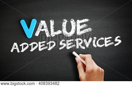 Hand Writing Value Added Services On Blackboard, Concept Background