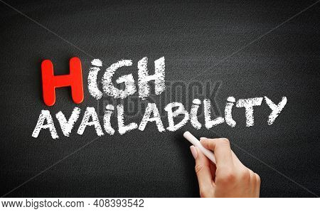 Hand Writing High Availability On Blackboard, Technology Concept Background
