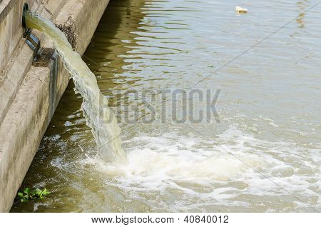 Flow Out Water From The Conduit To The River
