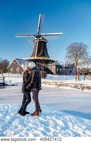 Pelmolen Ter Horst, Rijssen Covered In A Snowy Landscape Overijssel Netherlands, Historical Wind Mil