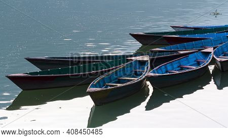 Multi-colored Wooden Boats On The Phewa Lake, Pokhara, Nepal