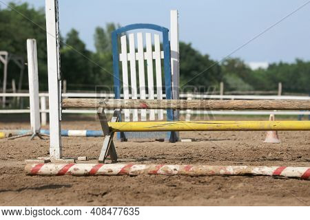 Colorful Barriers On The Ground For Jumping Horses And Riders At Riding School As A Background.obsta