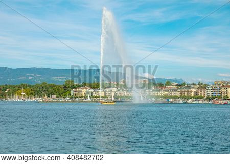 View Of Jet Deau Fountain Or Water Jet Fountain, Harbor And Geneva Lake. The Most Famous Attraction 