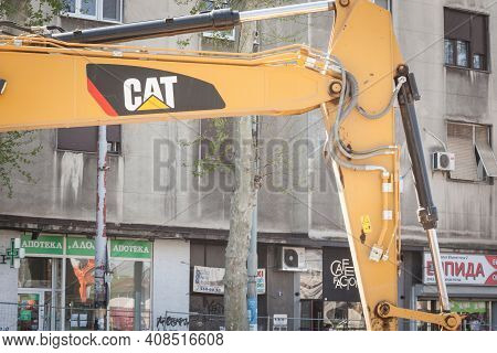 Belgrade, Serbia - April 23, 2020: Caterpillar Logo On One Of Their Machinery Engine, An Excavator, 
