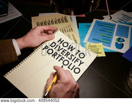 Man Reads About How To Diversify Your Portfolio For Investment And Savings.