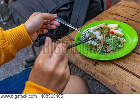 Female Traveler Eating Vietnamese Cuisine - Banh Cuon