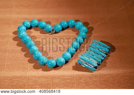 Beautiful Blue Beads. The Concept Of A Beautiful, Elegant Life And Beautiful Decoration For Woman