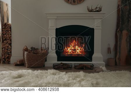 Firewood Burning Bright In Elegant Hearth Indoors