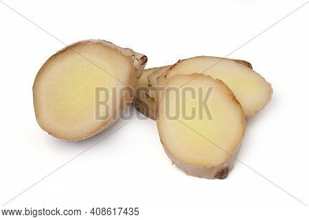 Isolated Slice Ginger. Fresh Ginger Root Rhizome On White Background, Herb Medical Cutout. Clipping 