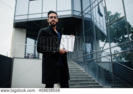 Middle Eastern Man Wear Black Coat, Eyeglasses, Hold White Empty Clipboard.