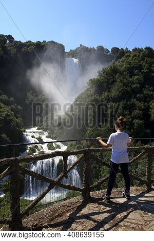 Terni (tr), Italy - May 10, 2016: A Girl Looks The Famous Marmore Waterfall, Terni, Umbria, Italy