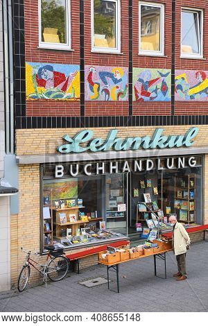 Witten, Germany - September 16, 2020: Person Visits Lehmkul Book Store In Downtown Witten, Germany. 
