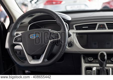 Russia, Izhevsk - August 14, 2020: Geely Showroom. Interior Of New Modern Car Geely Atlas With Autom