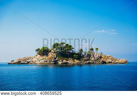 View On Grey Rock Islend In The Sea. Budva Riviera, Montenegro