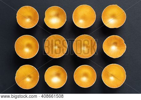 Gold Glitter Eggshell On A Black Background. Creative Glowing Easter Design Template For Advertising