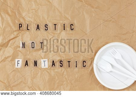 Disposable Appliances Plate, Fork, Spoon, Knife, Phrase From Letters On Transparent Base Plastic Not
