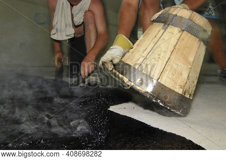 Hot Liquid Mastic Asphalt On The Floor