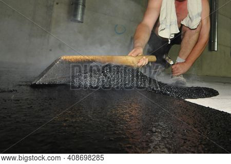 Hot Liquid Mastic Asphalt On The Floor