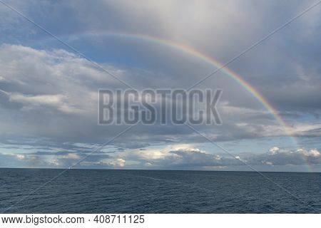 Seascape At Baltic Sea With Rainbow And Cloudy Sky. Summer Scenery After Rain From Rugen Island, In 