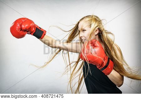 Girl In Red Gloves Playing Sports Boxing