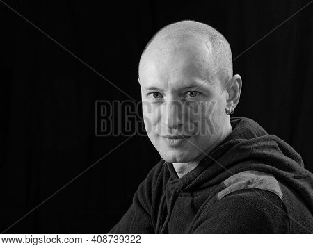 Bw Portrait Of A Bald Man On A Black Background