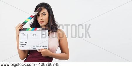 Asian Sexy Woman Hold White Clapper Board Or Movie Slate Isolated On White Background.she Have Tan S