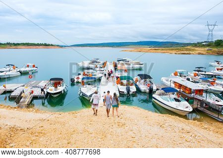 Capitólio - Mg, Brazil - December 09, 2020: Tourists Walking On Docks Of The Nautical Tours Area To 