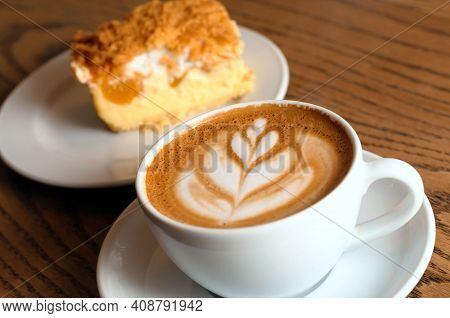 Coffee Business Concept - Cropped Close Up Of Female Serving Coffee With Latte Art While Standing In