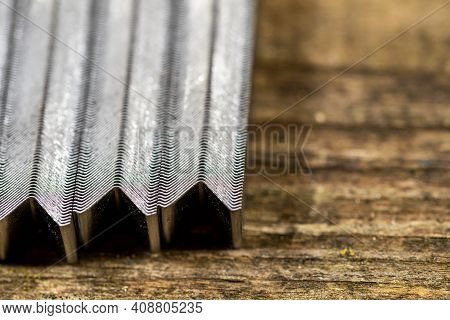 V Nails In Rows, This Special Nails Are Used By Picture Framers To Fix The Frames.