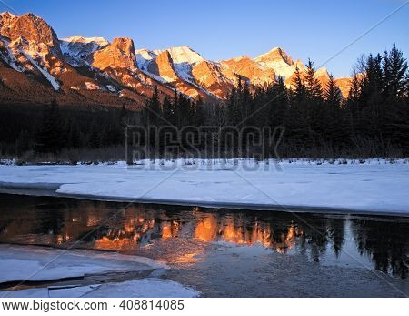 Mount Rundle And The Bow River In Winter From Canmore, Alberta, Canada