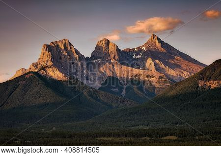 Three Sisters At Sunrise Near Canmore, Alberta, Canada