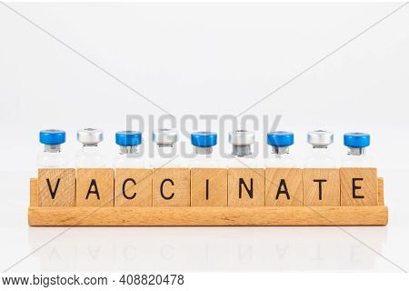 Get vaccinated concept in white background. Vaccinate word in english
