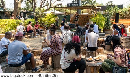 Johannesburg, South Africa - October 2019: Performer Singing On Stage In Fourways Farmers Market Wit