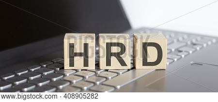 Hrd Abbreviation Stands For Written On Wooden Cube On Laptop