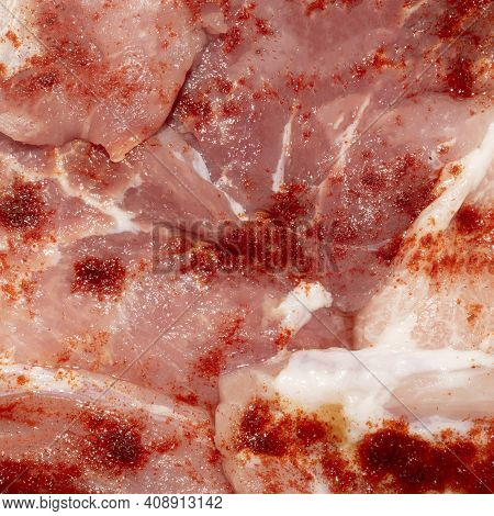Thinly Sliced Raw Meat In A Marinade With Red Pepper.raw Meat In Sliced Background.thin Sliced Meat 
