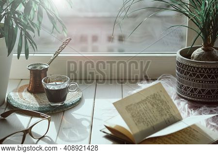 Oriental Coffee In Traditional Turkish Copper Coffee Pot With Flowers On Window Sill. Rustic Wooden 