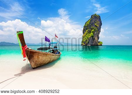 Thai Traditional Wooden Longtail Boat And Beautiful Sand Beach At Koh Poda Island In Krabi Province.